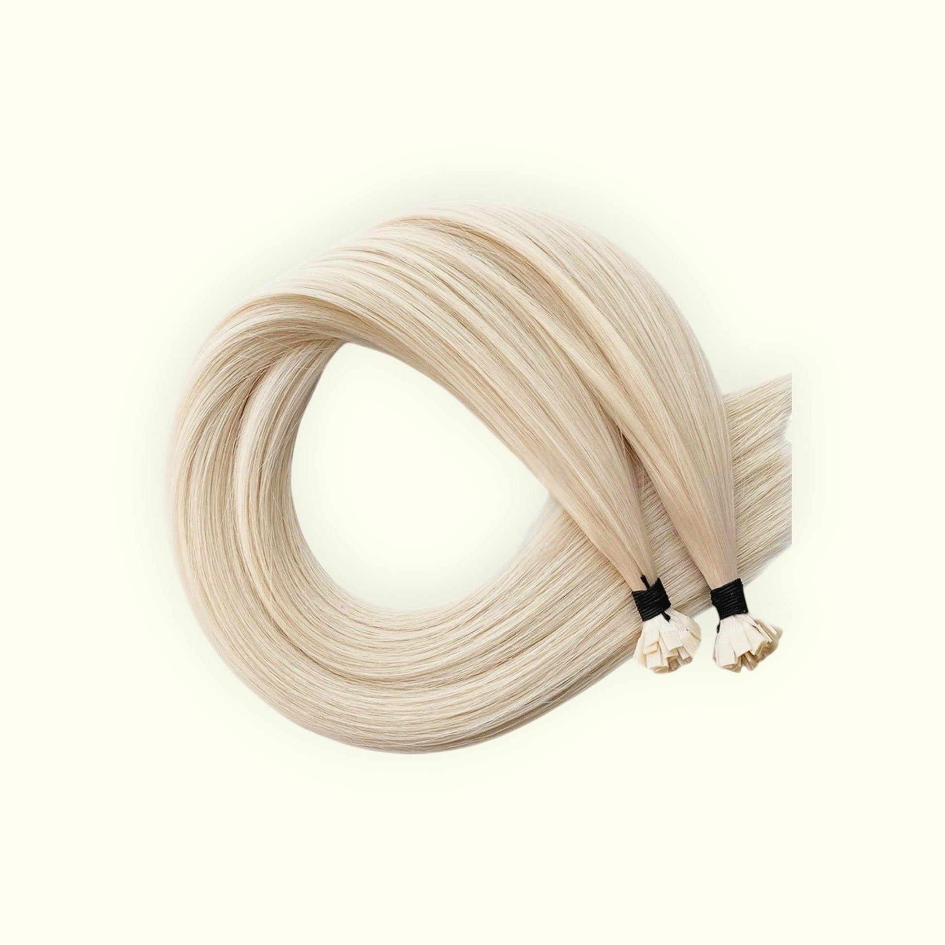 Blonde hair extensions on a white background